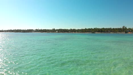 Aerial-of-beaches,-palm-trees,-and-the-ocean-in-one-of-the-Key-islands