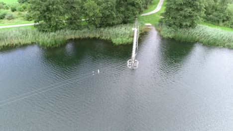 drone shot of pulling system at wakeboarding lake