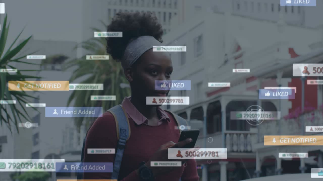 Animation of social media notifications over african american woman using smartphone in city street