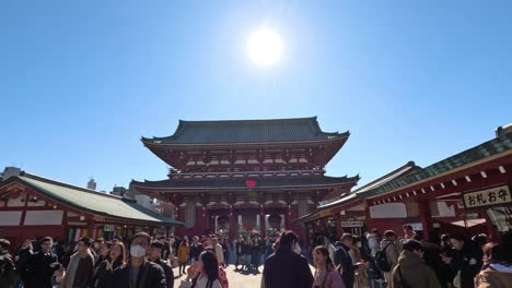 crowds visiting a traditional asian temple