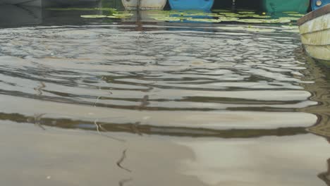 water being bailed from fishing boat