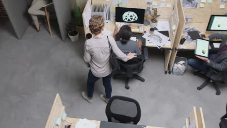 multi ethnic business people working in diverse modern office together brainstorming innovative ideas using computer technology top view