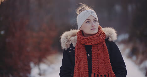 tourist walking in forest in winter 2