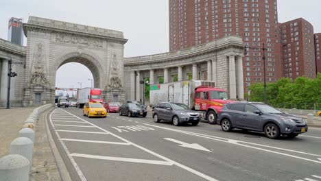 traffic exiting the manhatten bridge into chinatown