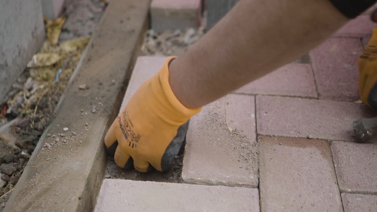 Installation of paving blocks in flooring, construction work