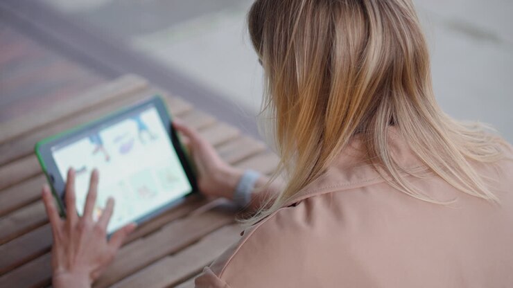 Woman shopping online on a tablet