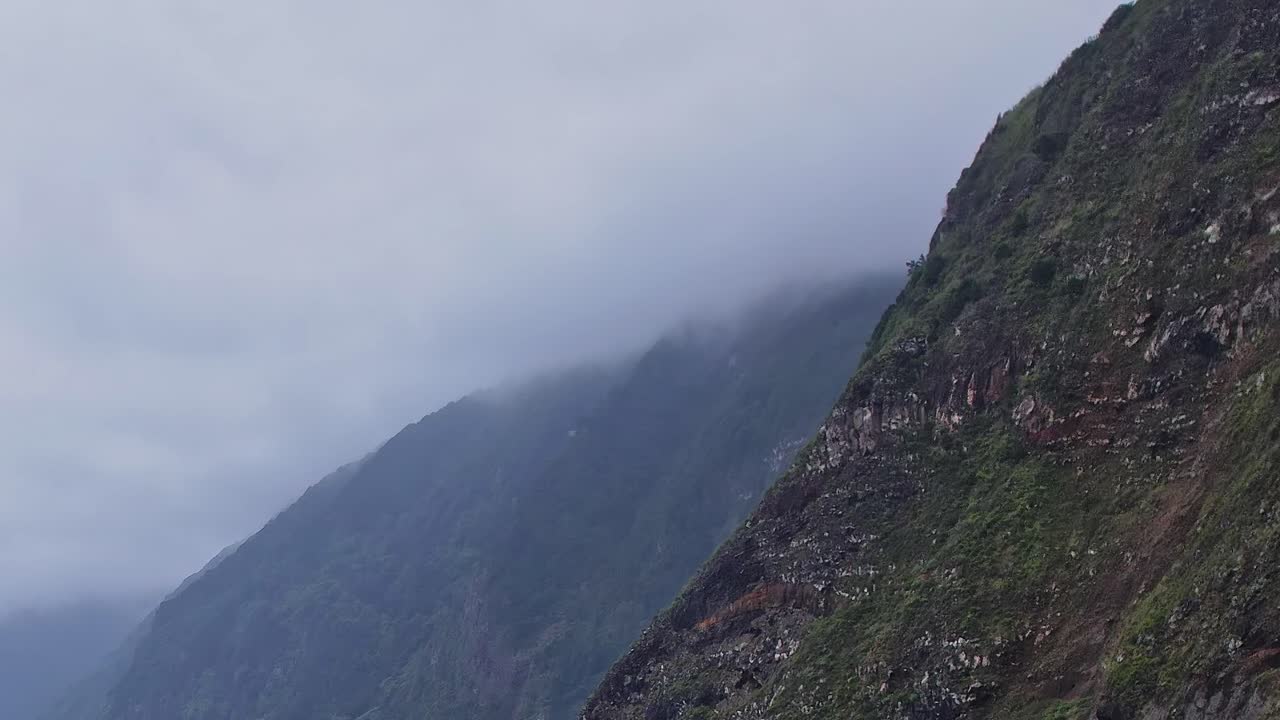 Stunning aerial view of Madeira's mountains shrouded in mist
