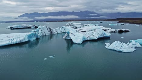 wide drone shot of jökulsárlón the glacier lagoon in iceland during summer