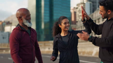 Workout,-together-and-people-high-five-in-city