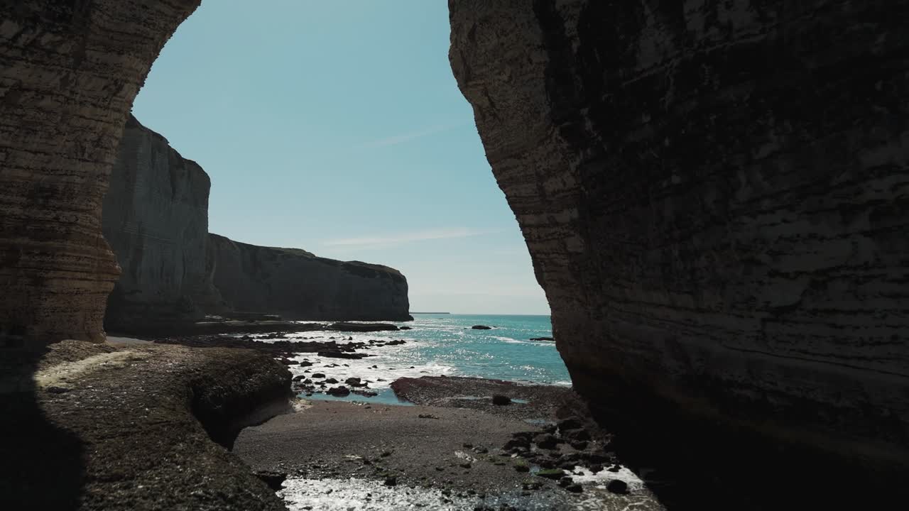 View of the famous natural sea arch at Étretat cliffs in Normandy, France