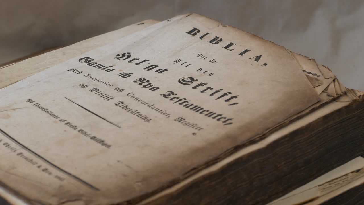 Aged holy Bible thick book written in latin scripture