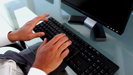 Close-up-of-hands-typing-