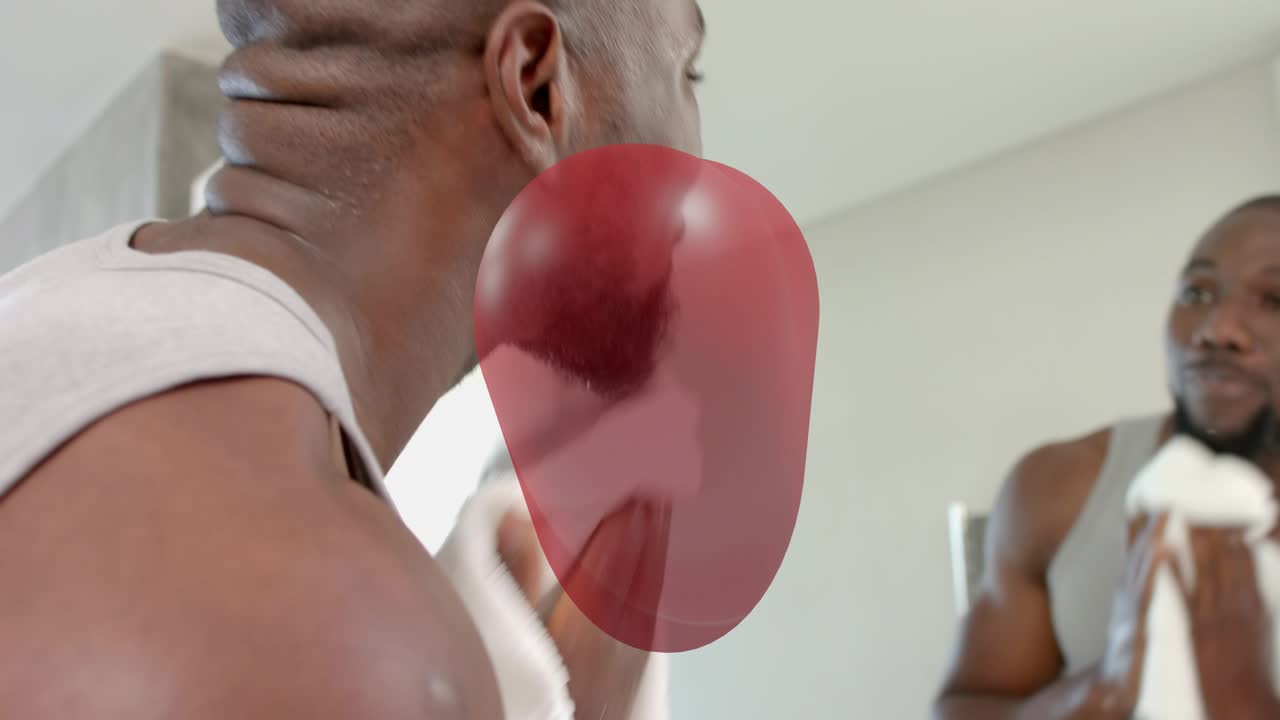 Man grabbing towel, patting face, inspecting beard for grooming, heart overlay centered over mirror