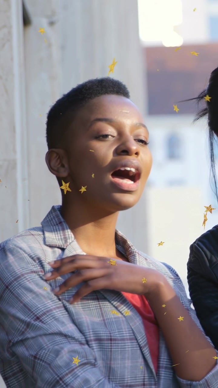 Vertical video: Gold-stars appearing causing woman shifting into singing, expressing for marketing
