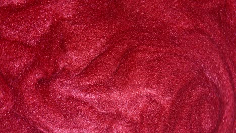 Fondo de textura de glitter rojo