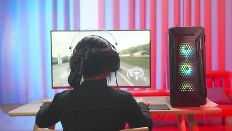 woman gaming on pc