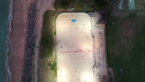 DRONE-AERIAL-VIEW-OF-KALAMA-SKATE-PARK-WITH-SHORELINE-AND-WAVES