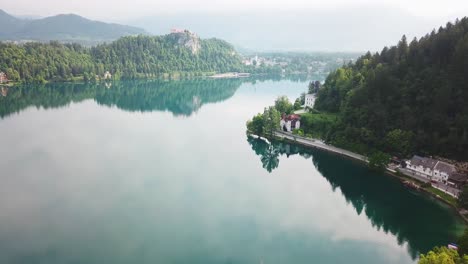 aerial view of lake bled's shoreline on a warm summer day