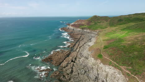 coastal headland in north devon on a summer’s day fading out towards the ground