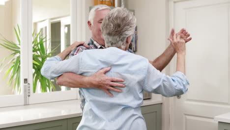 Old-couple-dancing-a-waltz