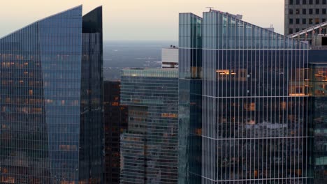 Panning-left-drone-shot-of-buildings-in-downtown-Houston,-Texas