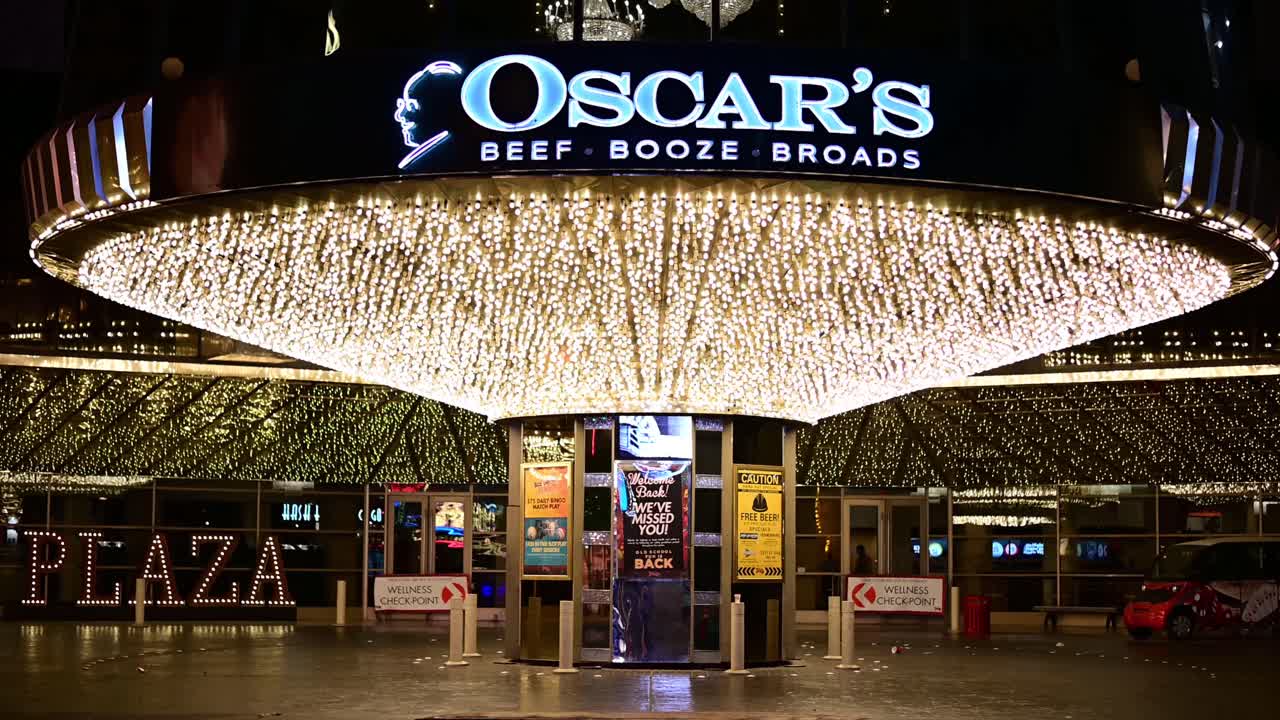 Empty hotel entrance with illuminated valet area