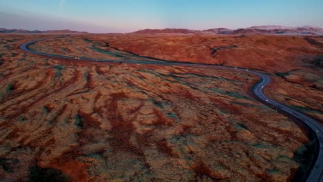 highway 1 at hellisheidi winding through lava fields in south iceland