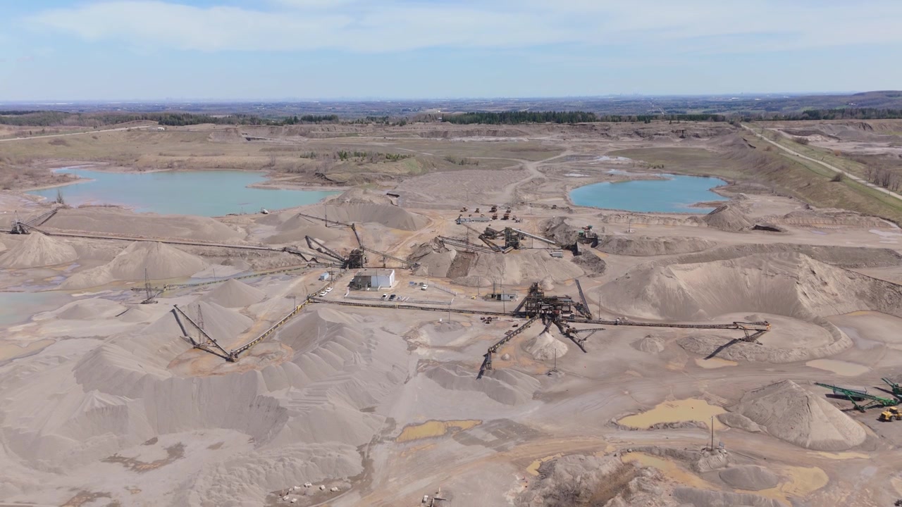 Aggregate Terrain With Rock Drilling Rig At Industrial Quarry Near Caledon Village, Ontario, Canada. Aerial Shot