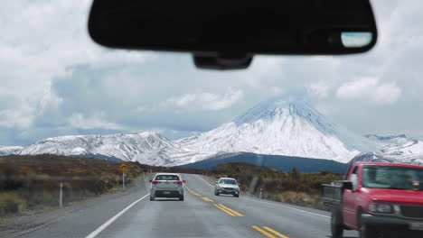 driving down a highway and passing a truck