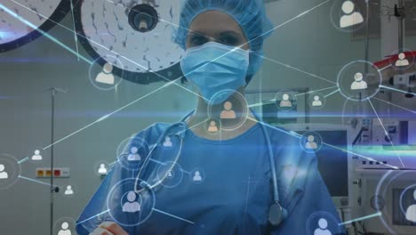 Animation-of-network-of-connections-with-icons-over-female-surgeon-in-operating-theatre