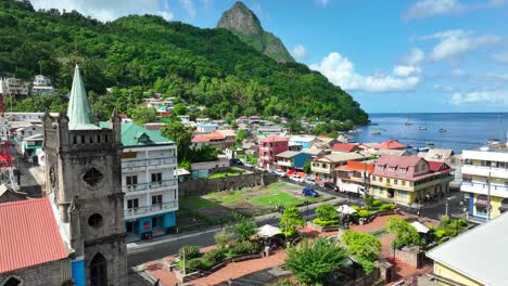 historic town square in soufrière, saint lucia, featuring a stone church with a pointed tower