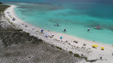 summer beach getaway, drone shot turn right cayo de agua island, beach panoramic view