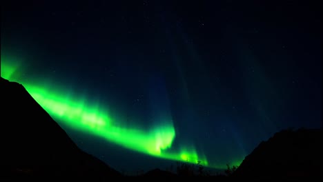 aurora explosion at rystad lofoten norway with intense