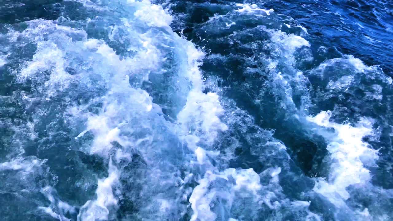 Churning waters of the Caribbean, beautiful crystal clear waters rolling and bubbling in slow motion Segment 2 of 2