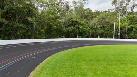 cycling track amidst lush greenery and buildings