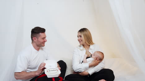 happy family celebrating baby's 2 months