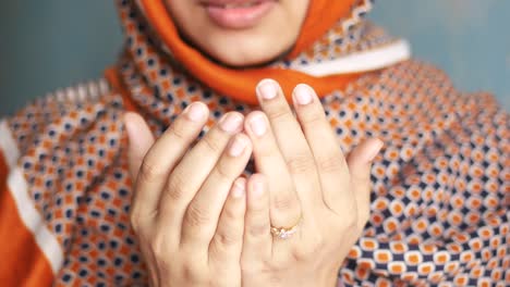 close up of muslim women hand praying at ramadan