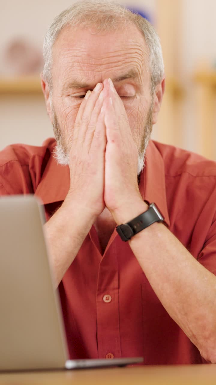 Tired Senior Man at Computer