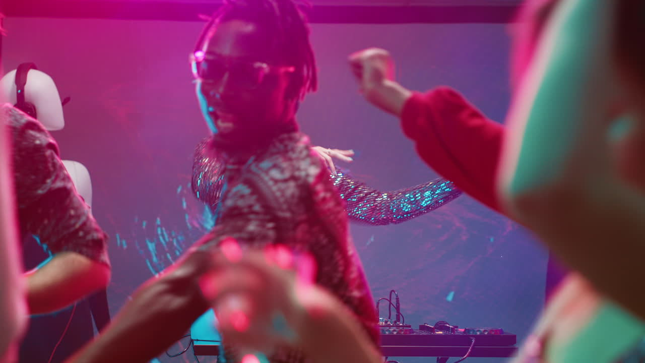 People enjoying a party and dancing in a club