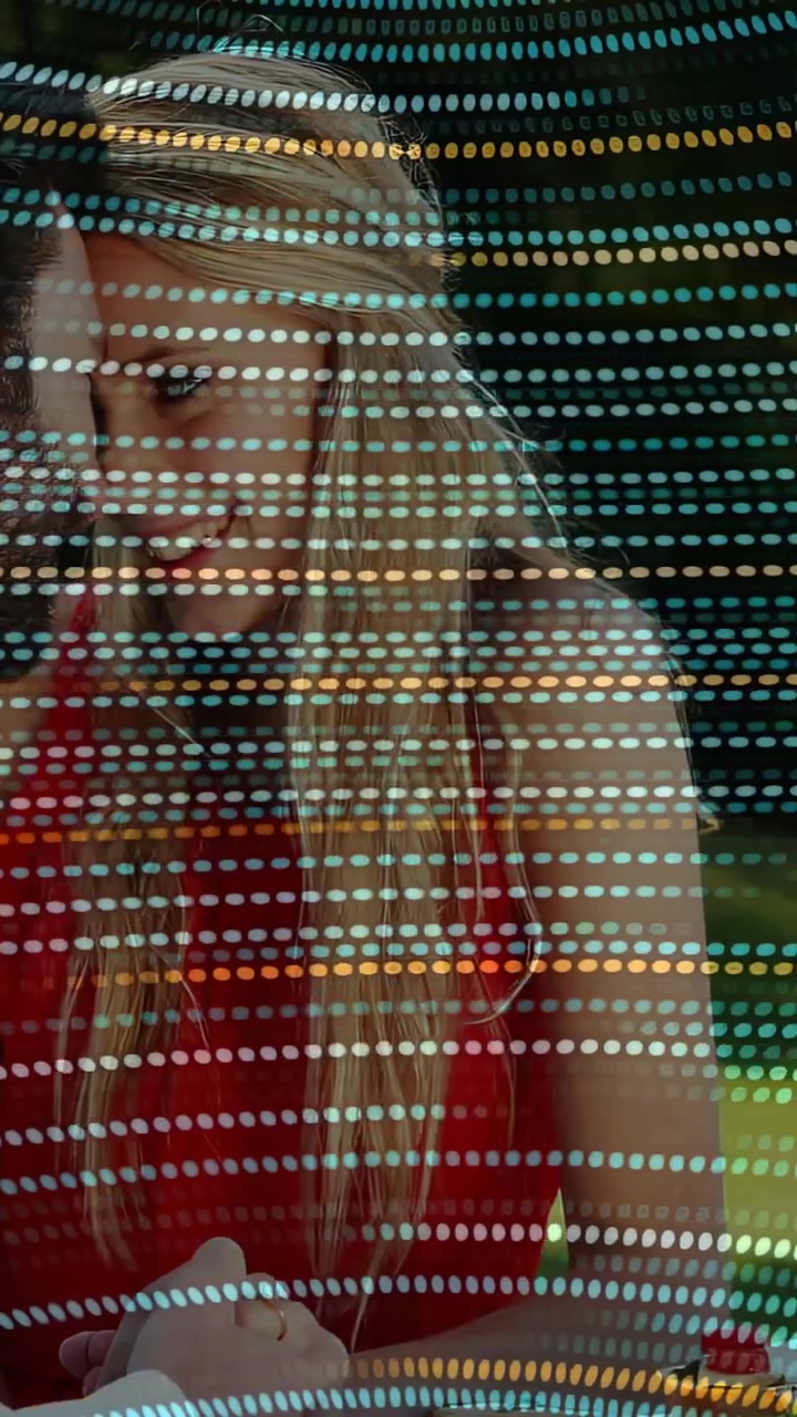 Vertical video: Woman leaning, connecting with partner at lifestyle table, dot overlay crossing