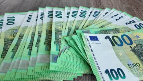 unfolded euro banknotes lie spread out on the table