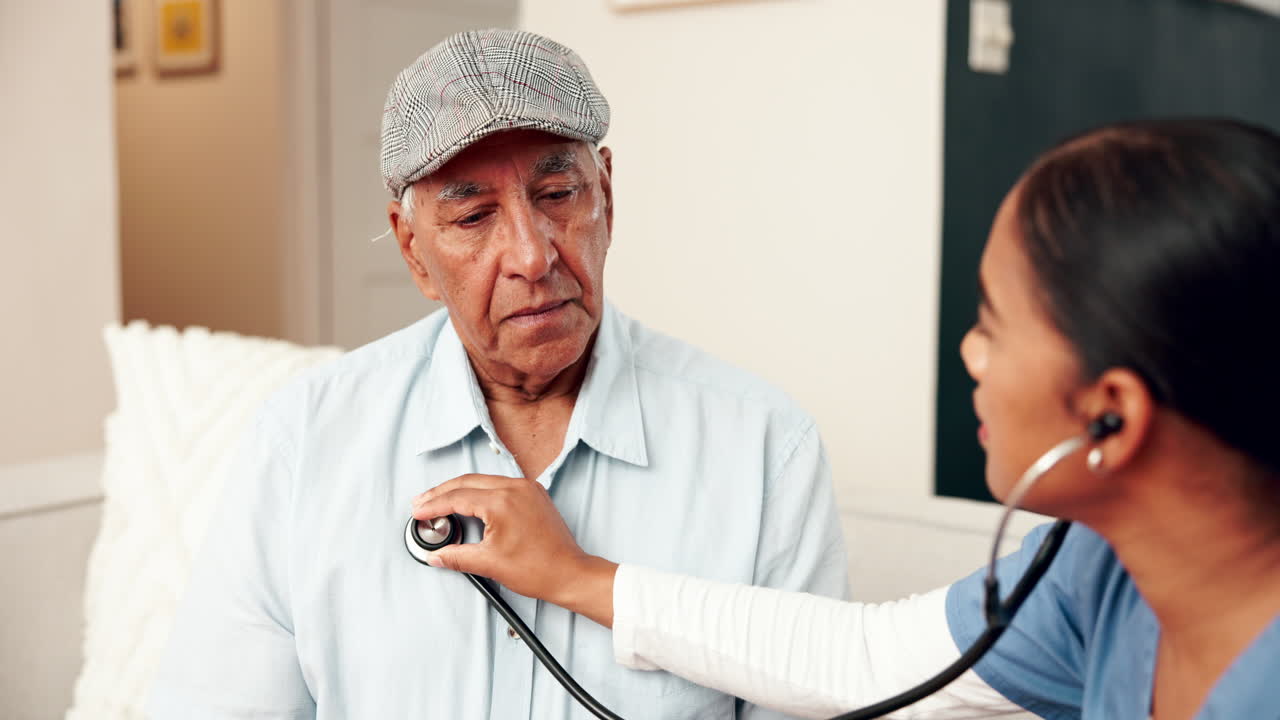 Doctor examining senior patient at home