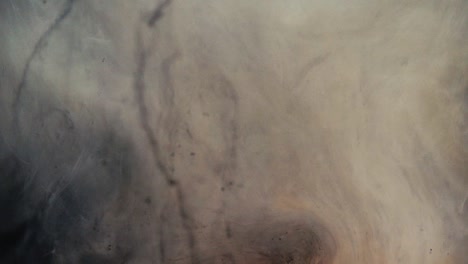 reshaping the cosmos by using dark paint dissolving in water, shot in slow motion with sony a7iii.