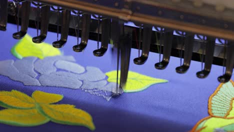 automatic industrial sewing machine for stitch by digital pattern. modern textile industry.
