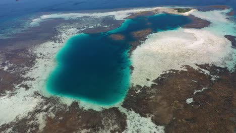 Aerial-view-of-coral-reef-in-Taka-Makassar,-Komodo-National-Park,-Indonesia