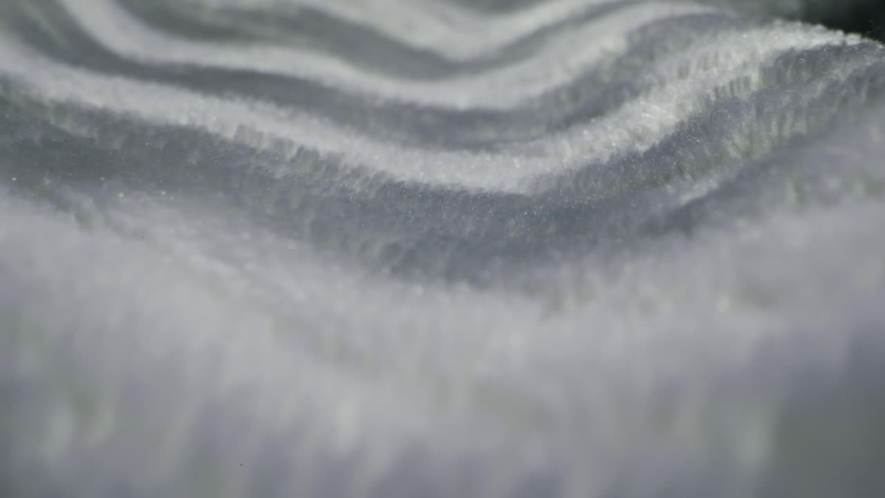 Closeup of an expertly tailored suit that beautifully showcases its sophisticated buttons and fine fabric texture