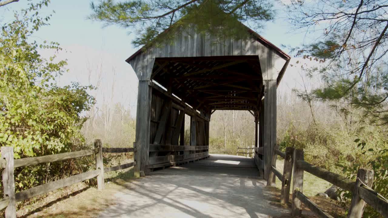 Old fashioned, wooden covered bridge at Slate Run Farm Metro Park in Canal Winchester, Ohio.