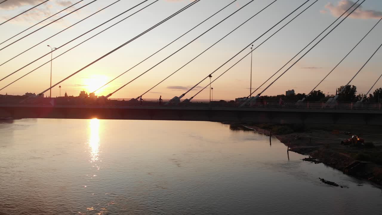 Sunset on the bridge overlooking the city