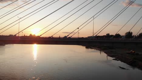 sunset on the bridge overlooking the city