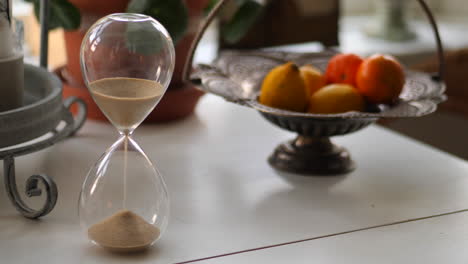 Hourglass-sand-falling-in-slow-motion-cinematic-paning